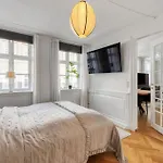 Og Charmerende